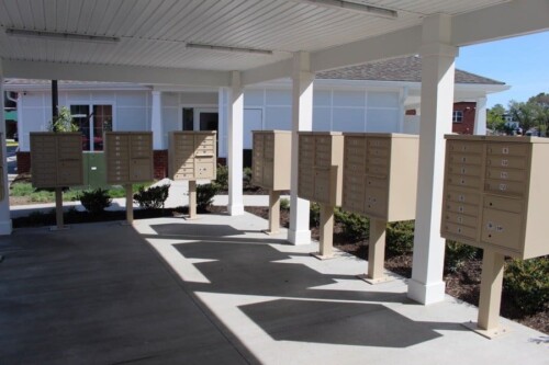 Covered mailbox kiosk at Clairmont at Campostella Station Apartments